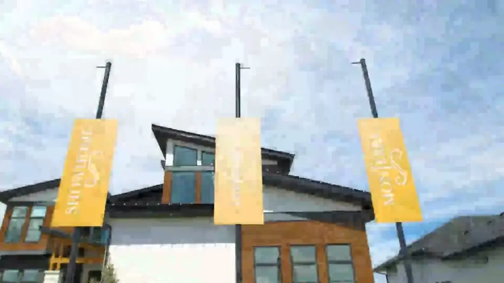 MonTerra showhome banners against a blue sky on Family Adventure Day